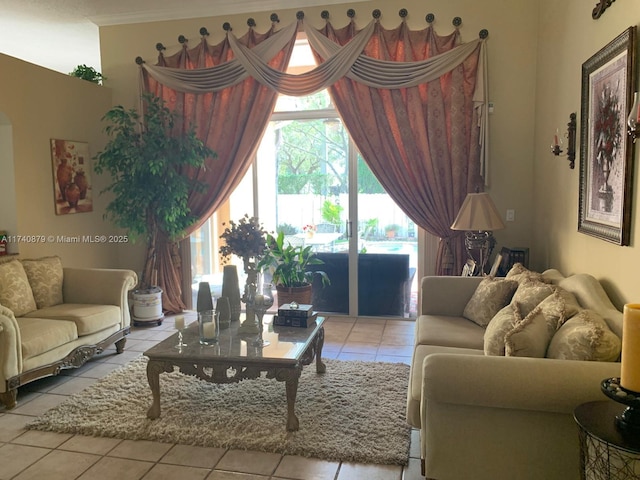 living room with light tile patterned floors