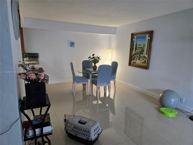 8485 SW 156th Pl Unit 106, Miami, FL 33193 - tiled dining area featuring baseboards