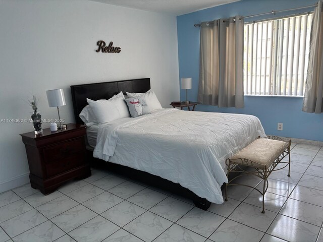 8485 SW 156th Pl Unit 106, Miami, FL 33193 - bedroom with light marble finish flooring