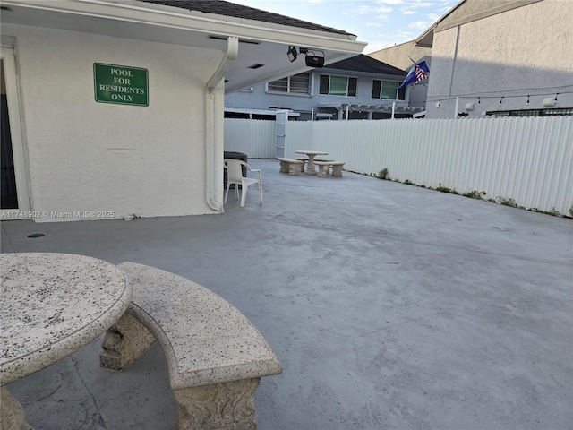 view of yard with a patio and fence