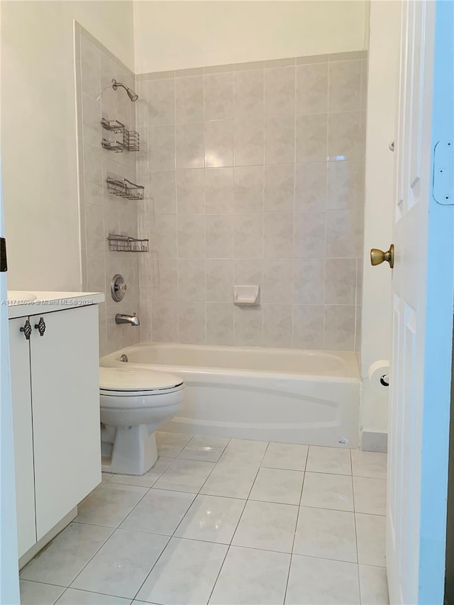 bathroom featuring shower / bathtub combination, vanity, tile patterned flooring, and toilet