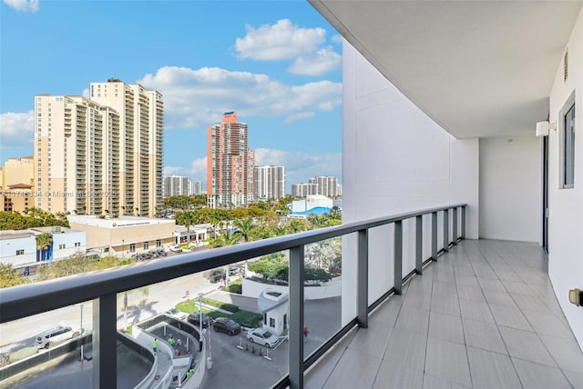 balcony featuring a view of city