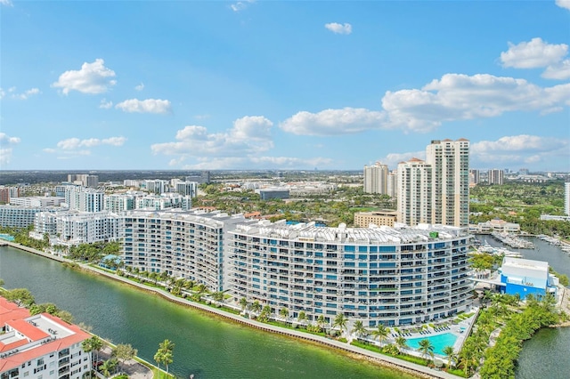 drone / aerial view with a view of city and a water view
