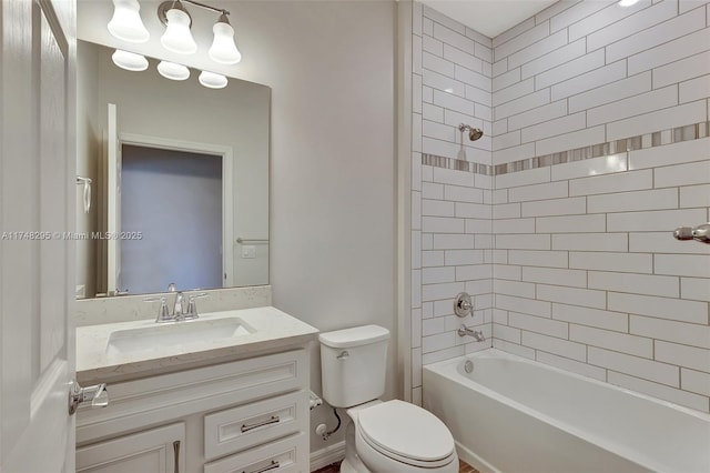 bathroom with shower / bathing tub combination, vanity, and toilet