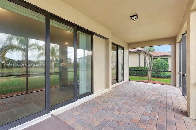 view of unfurnished sunroom