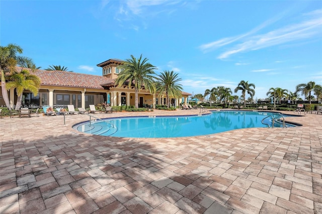 pool with a patio area