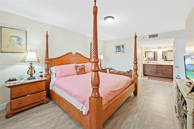 801 Sw 141 101O, Pembroke Pines, FL 33027 - bedroom with connected bathroom and visible vents
