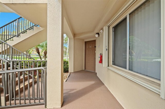 801 Sw 141 101O, Pembroke Pines, FL 33027 - view of exterior entry featuring stucco siding
