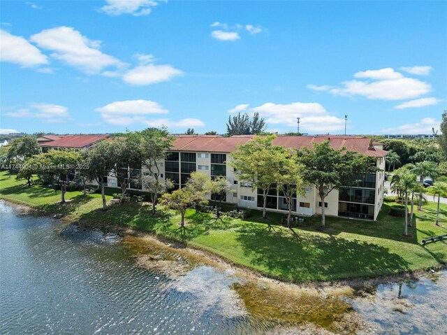 801 Sw 141 101O, Pembroke Pines, FL 33027 - back of property featuring a yard and a water view