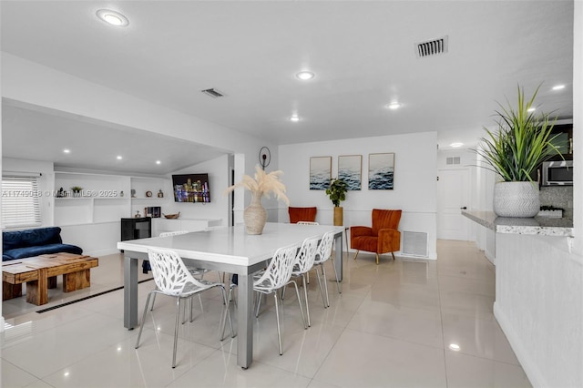 2510 NE 215th St, Miami, FL 33180 - dining area featuring visible vents and recessed lighting
