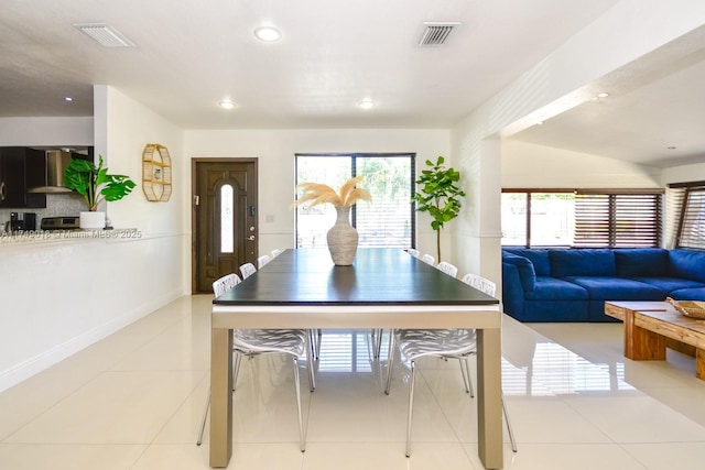 dining area featuring recessed lighting, visible vents, baseboards, and light tile patterned floors