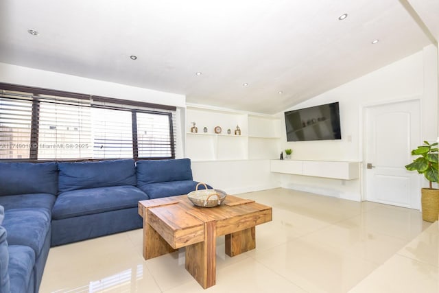 living room featuring vaulted ceiling, light tile patterned floors, and recessed lighting