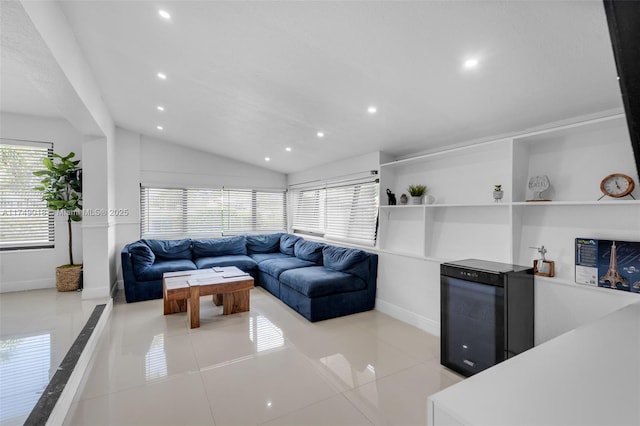 2510 NE 215th St, Miami, FL 33180 - living room with baseboards, lofted ceiling, beverage cooler, and recessed lighting