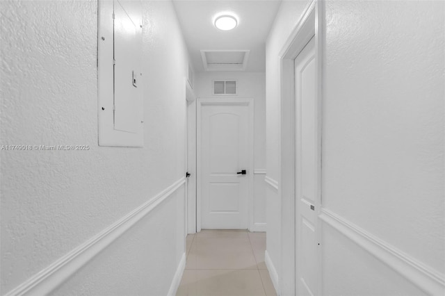 2510 NE 215th St, Miami, FL 33180 - corridor featuring electric panel, baseboards, visible vents, and light tile patterned floors