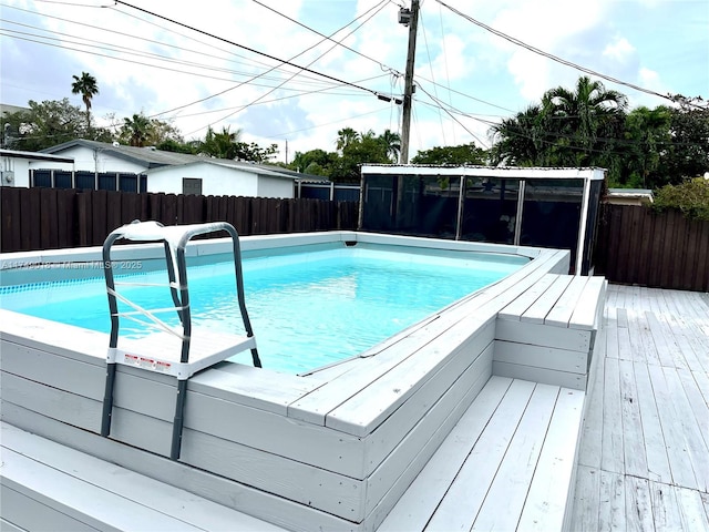 view of pool with fence and a fenced in pool