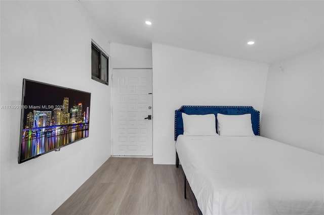 2510 NE 215th St, Miami, FL 33180 - bedroom with recessed lighting and wood finished floors