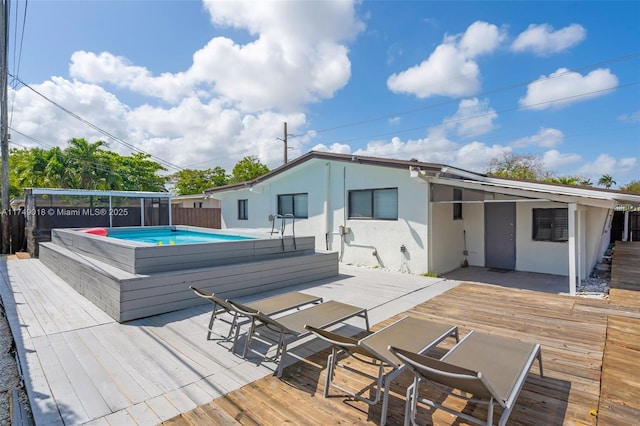 2510 NE 215th St, Miami, FL 33180 - deck featuring fence and a fenced in pool