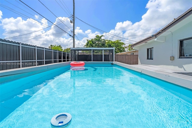 2510 NE 215th St, Miami, FL 33180 - view of swimming pool with a fenced backyard and a fenced in pool