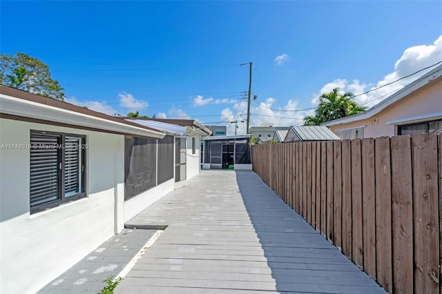 2510 NE 215th St, Miami, FL 33180 - deck with fence and a sunroom