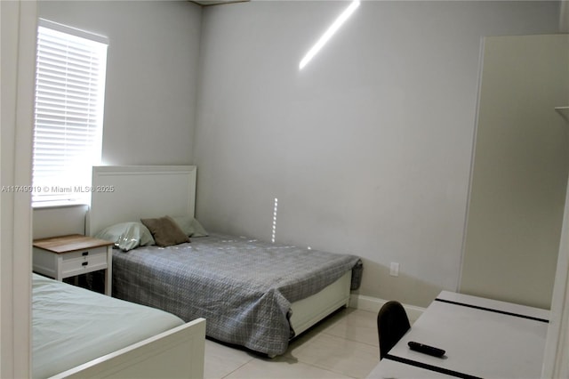 2915 65th St W, Lehigh Acres, FL 33971 - bedroom with light tile patterned floors