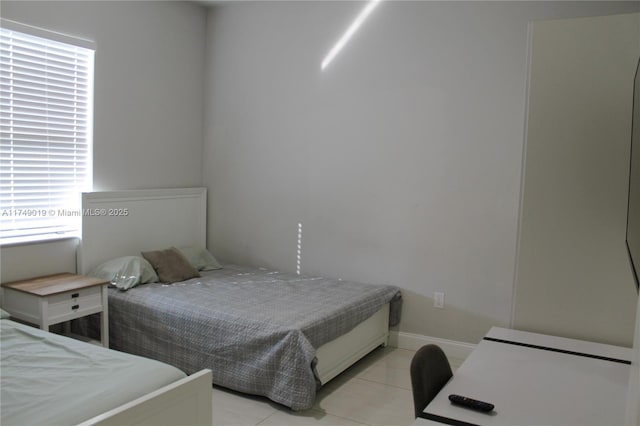 2915 65th St W, Lehigh Acres, FL 33971 - bedroom with light tile patterned floors