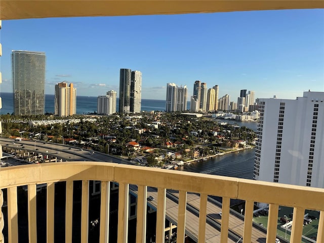 property's view of city featuring a water view