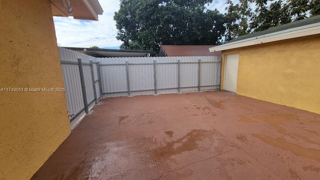 11715 SW 183rd St, Miami, FL 33177 - view of patio with fence