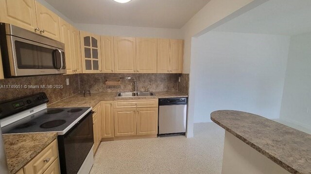 11715 SW 183rd St, Miami, FL 33177 - kitchen with appliances with stainless steel finishes, a sink, and light brown cabinetry