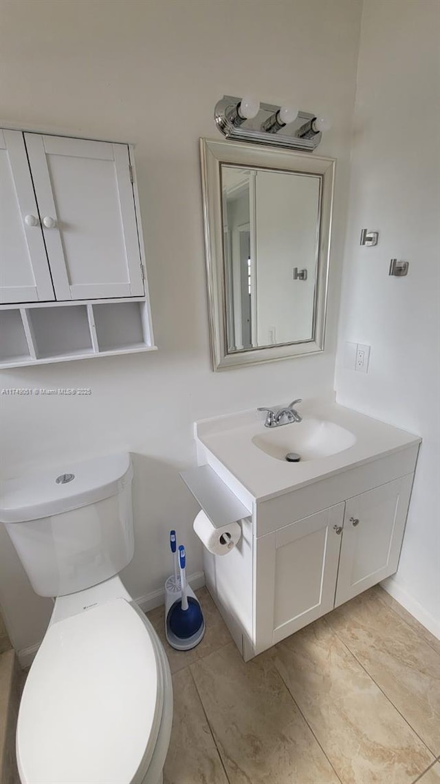 11715 SW 183rd St, Miami, FL 33177 - bathroom with vanity, toilet, and baseboards