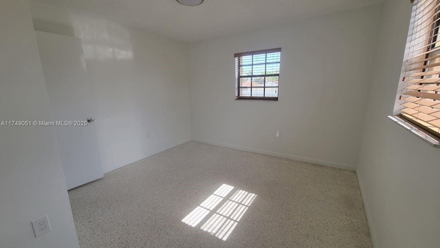11715 SW 183rd St, Miami, FL 33177 - empty room featuring speckled floor