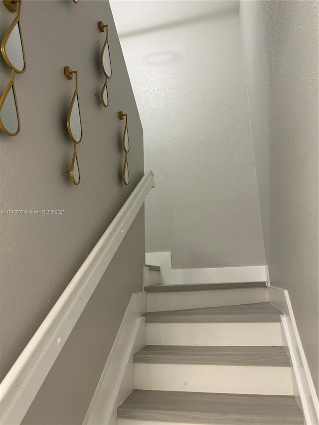 22511 SW 88th Pl, Cutler Bay, FL 33190 - stairway with a textured wall