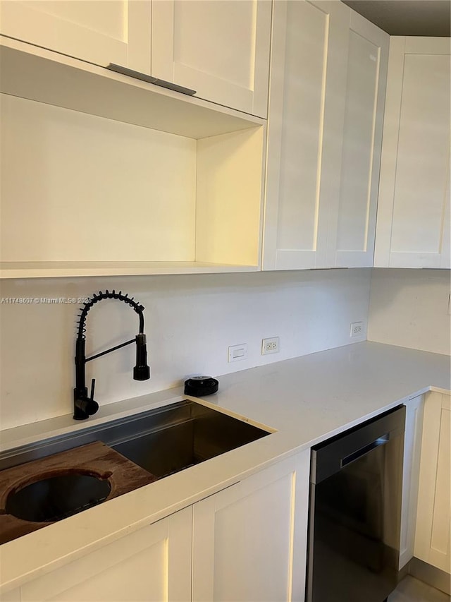 22511 SW 88th Pl, Cutler Bay, FL 33190 - kitchen featuring dishwasher, light countertops, a sink, and white cabinets