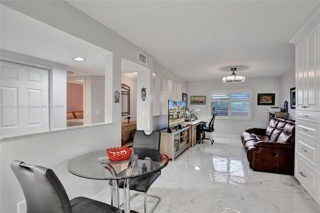 dining area featuring recessed lighting, visible vents, marble finish floor, and baseboards