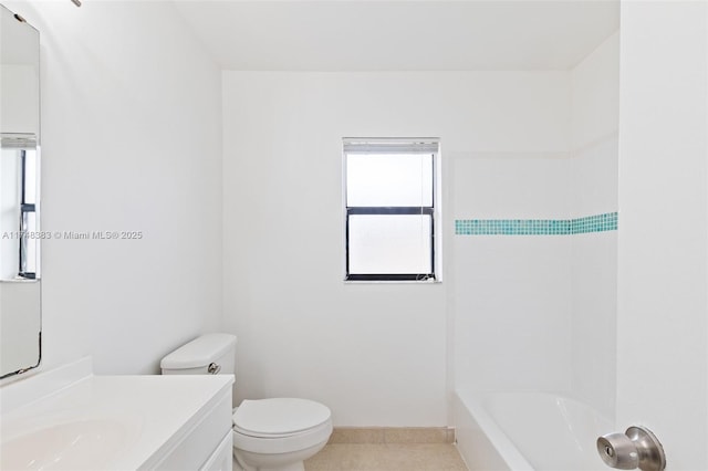 full bathroom with bathing tub / shower combination, toilet, vanity, tile patterned flooring, and baseboards