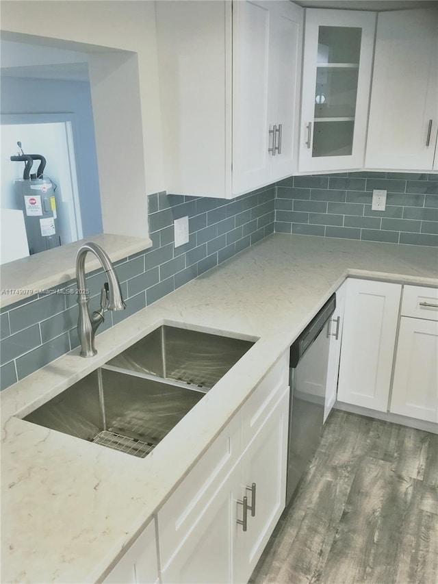 3883 Chickasha Rd, Lake Worth, FL 33462 - kitchen featuring dishwasher, white cabinets, backsplash, and light stone countertops