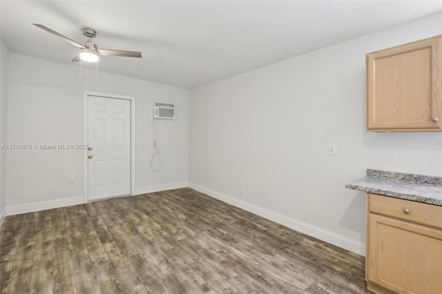 3883 Chickasha Rd, Lake Worth, FL 33462 - spare room featuring wood finished floors, a ceiling fan, and a wall unit AC
