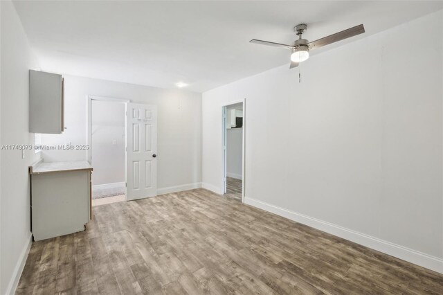 3883 Chickasha Rd, Lake Worth, FL 33462 - empty room featuring wood finished floors and a ceiling fan