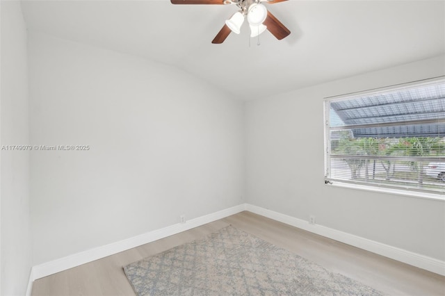 3883 Chickasha Rd, Lake Worth, FL 33462 - unfurnished room with ceiling fan, lofted ceiling, and light wood-style floors