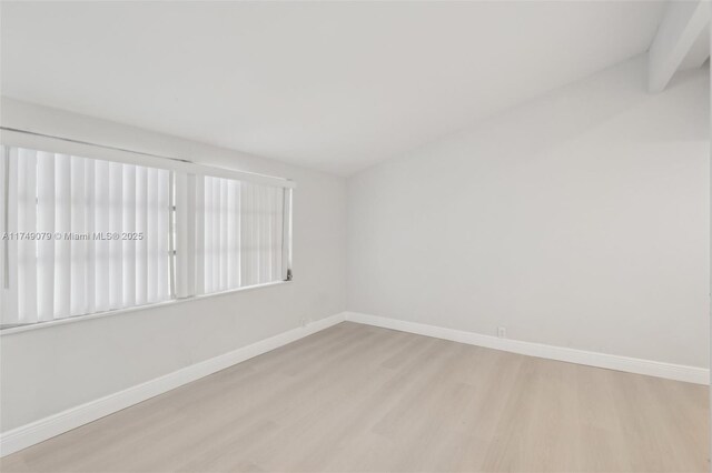 3883 Chickasha Rd, Lake Worth, FL 33462 - empty room with wood finished floors and baseboards