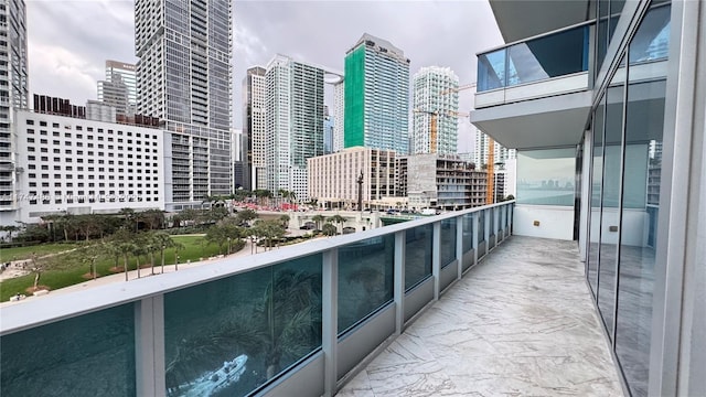 balcony featuring a view of city