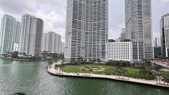 property's view of city featuring a water view