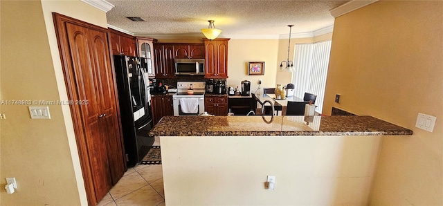 18860 NW 12th St, Pembroke Pines, FL 33029 - kitchen with stainless steel microwave, electric range, black fridge with ice dispenser, ornamental molding, and a peninsula