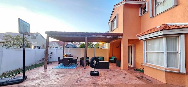 view of patio featuring outdoor dining area, outdoor lounge area, a fenced backyard, and a pergola