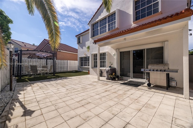 view of patio / terrace featuring grilling area and fence private yard