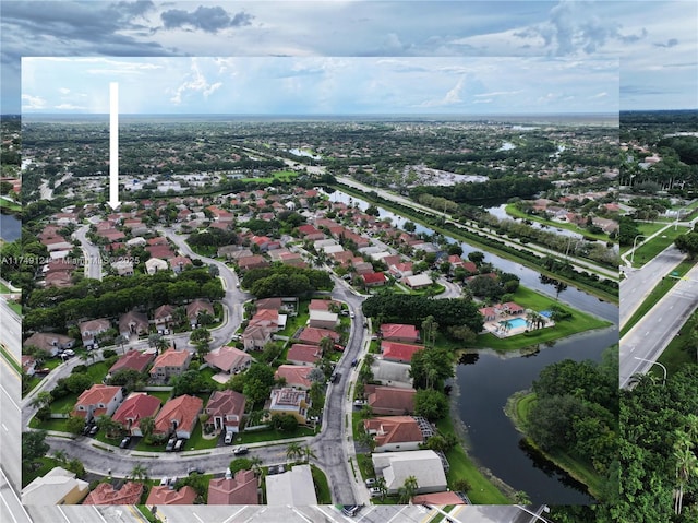 bird's eye view with a residential view and a water view