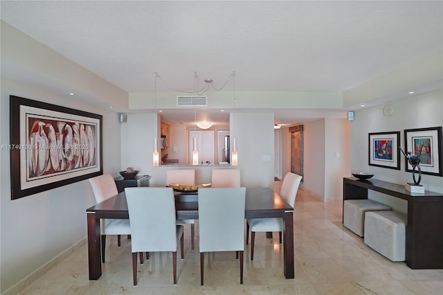 dining space featuring baseboards, visible vents, and recessed lighting