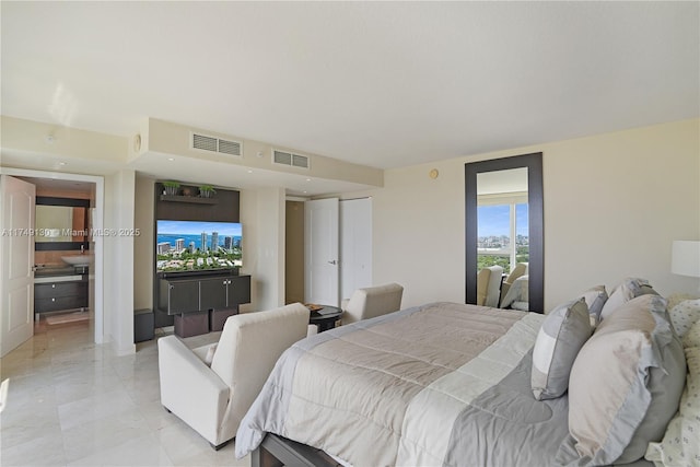 bedroom featuring visible vents