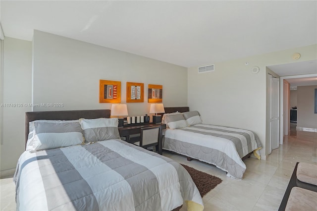 bedroom with marble finish floor and visible vents