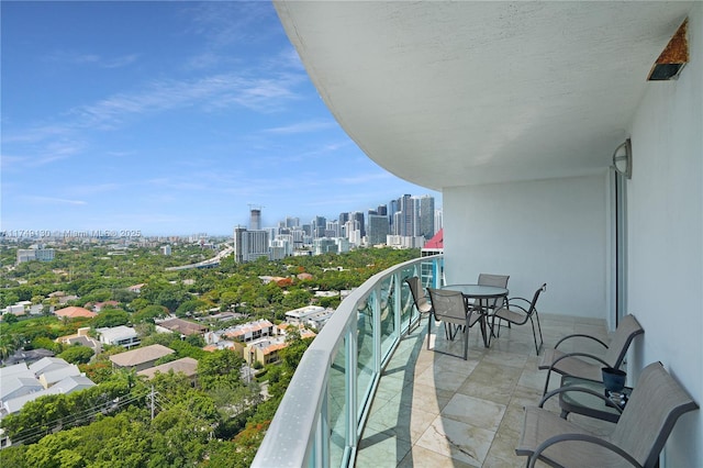 balcony featuring a city view