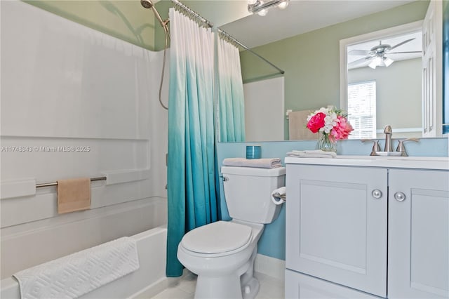 full bath featuring toilet, vanity, a ceiling fan, and shower / bathtub combination with curtain